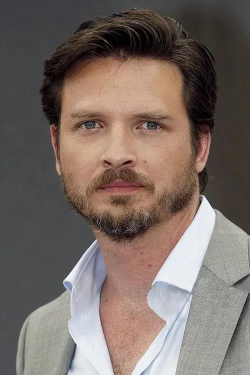 Photo of Aden Young